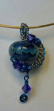 Wirewrapped beautiful blue galaxy bead pendant