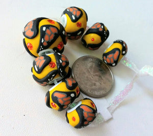 Set of 7 clay Butterfly beads with Swarovski chaton accents