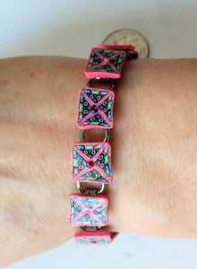 Pink Kaleidescope Cane with Swarovski crystal accents on a silver bracelet