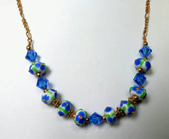 Glass Forget-me-nots and Swarovski in Blue on Gold Chain