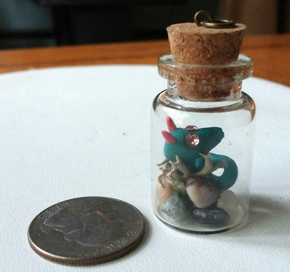 Miniature Dragon in her Cache Pendant