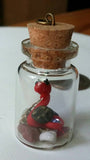 Tiny Dragon with cache Pendant in red